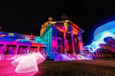 Bathurst Courthouse illuminated with bright vibrant colours.