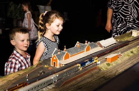 Kids exploring the Brio train layout at the Bathurst Rail Museum
